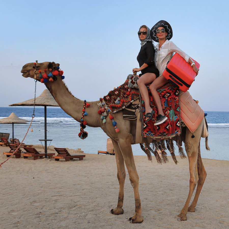15-Must-Pack Items-Morocco-Trip-Women-on-Camel-Morocco-Travel-Blog